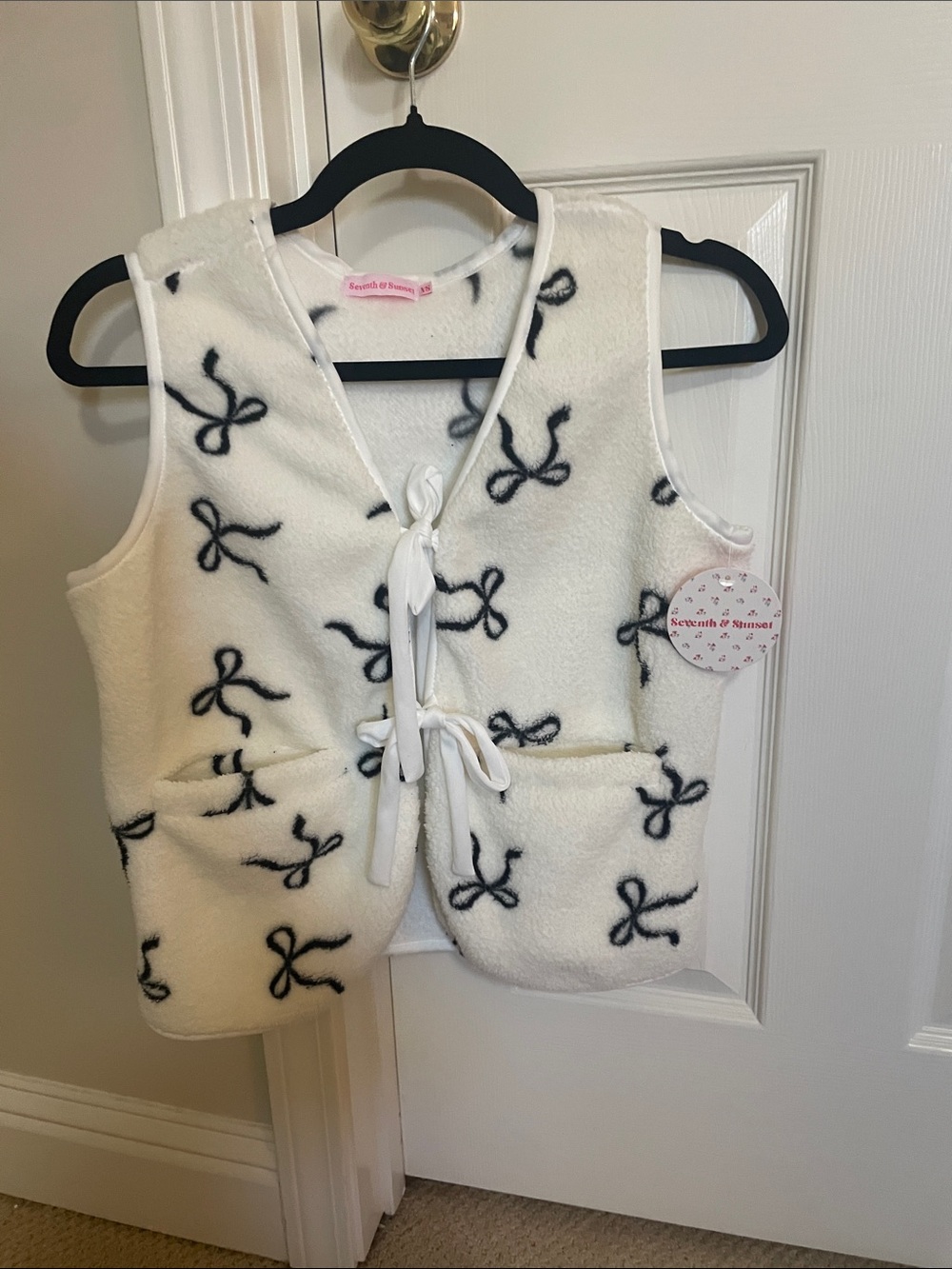 Cream Fleece Vest with Navy Bow Print